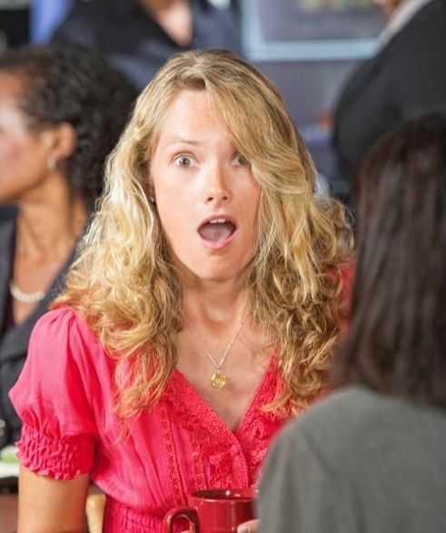 Shocked woman at party