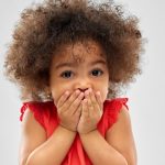 Little girl looking shocked